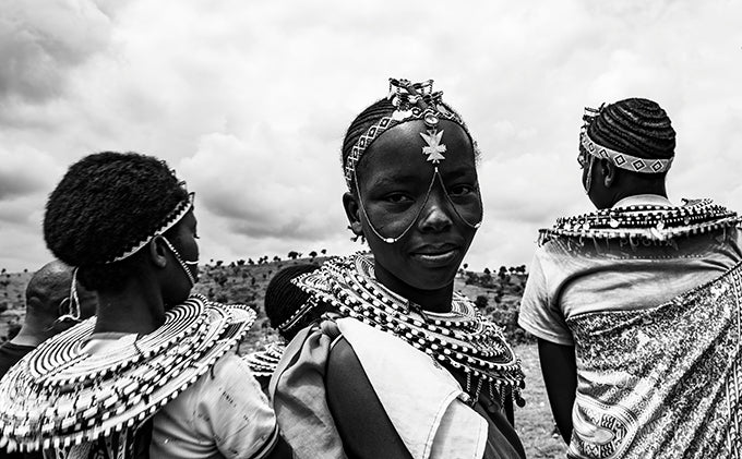 Picture of 3 individuals in Rift Valley Kenya waring Traditional Accessories