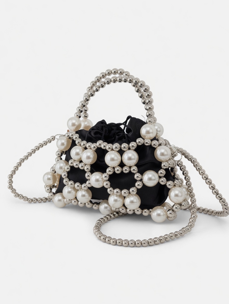 "Handmade luxury Sanyu handbags in navy blue, classic white, and matte black, featuring intricate pearl beadwork, structured geometric shapes, and matching beaded top-handles and shoulder straps."